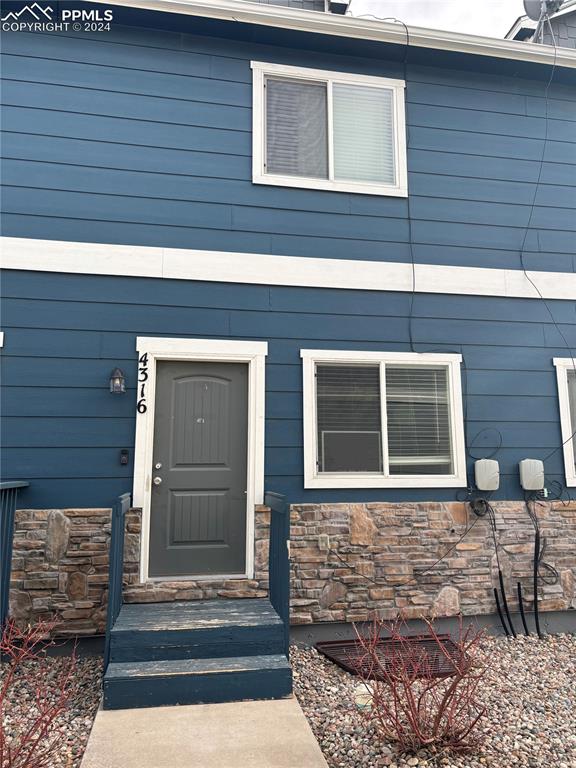 a front view of a house with a window