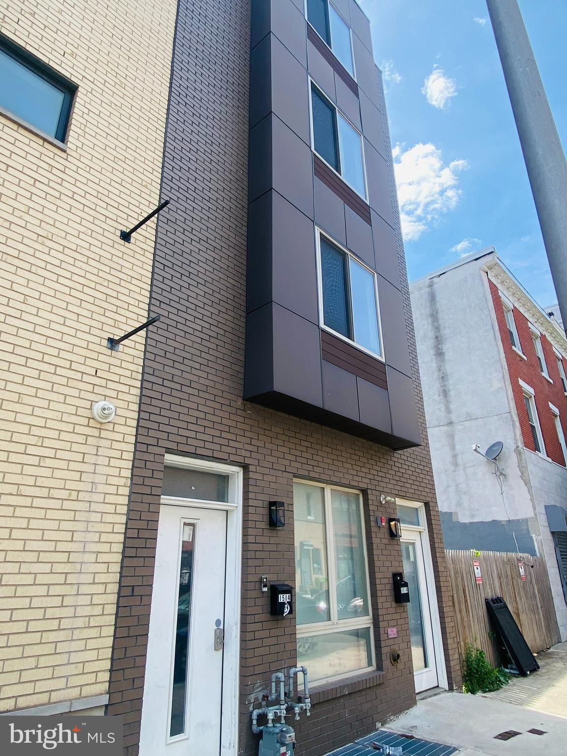 a view of a brick buildings with entryway