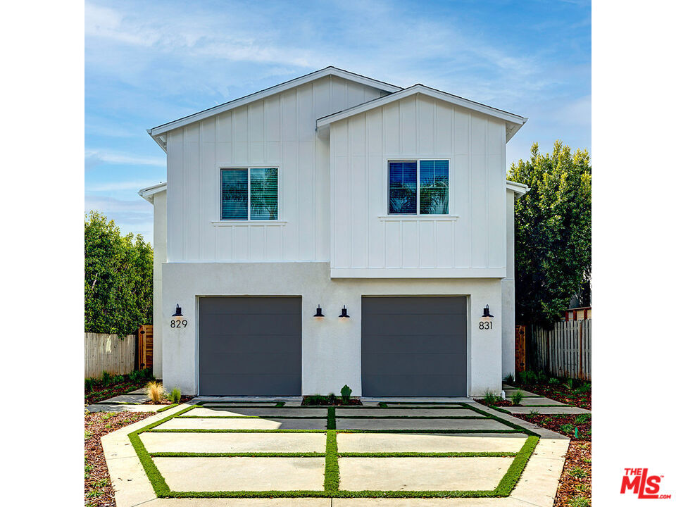 a view of front door and yard