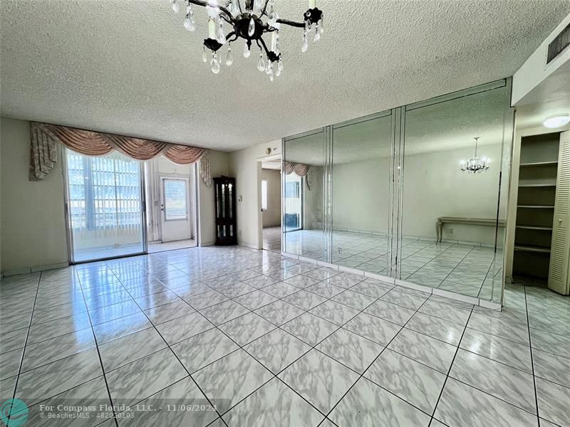 a view of an empty room and window