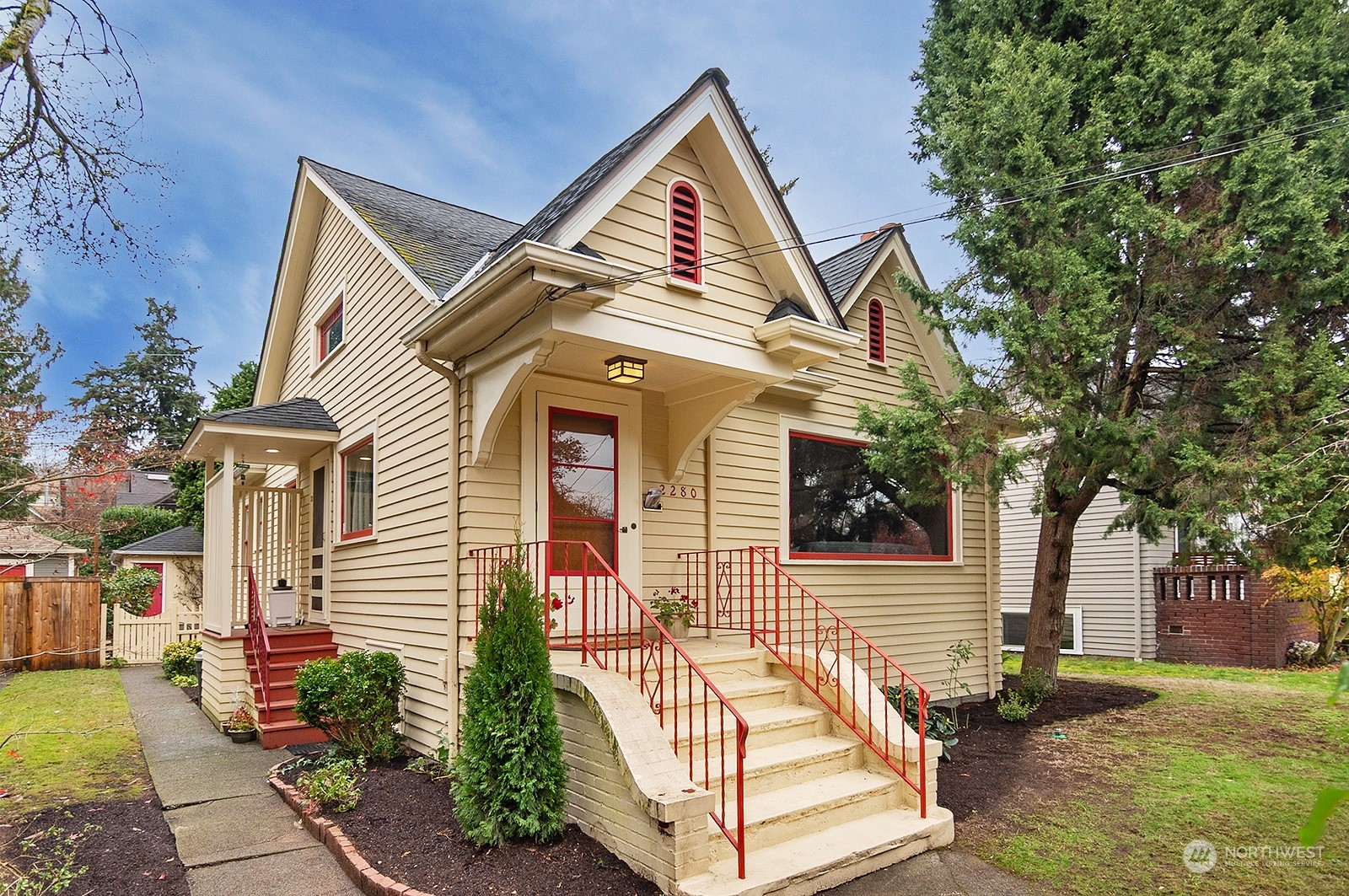 a view of a house with a yard