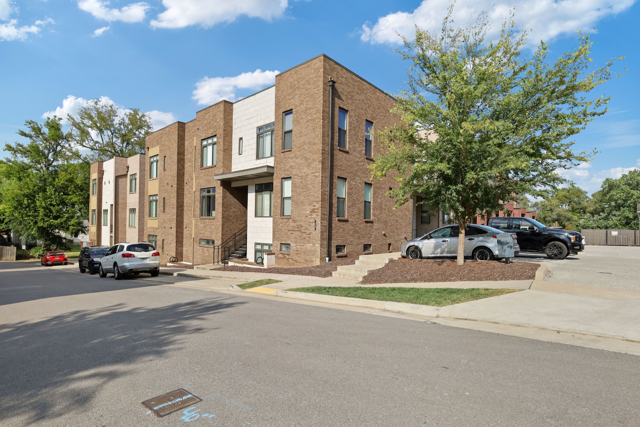 a view of a building with a street