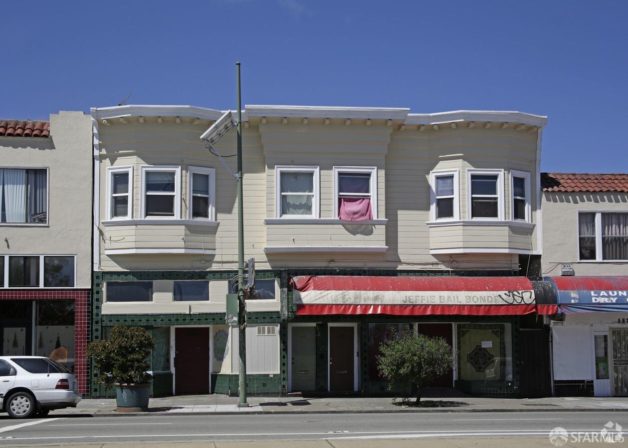 a view of a building with a street