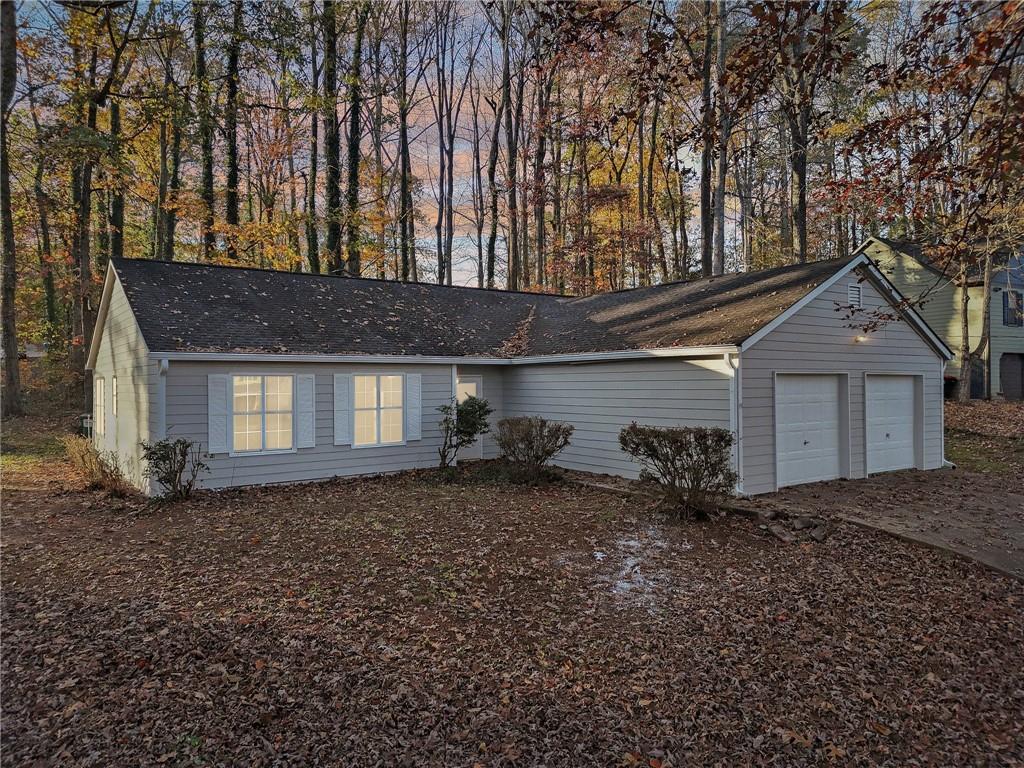 a front view of a house with yard