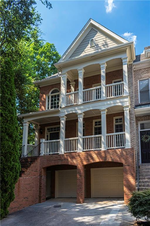 a front view of a house with balcony