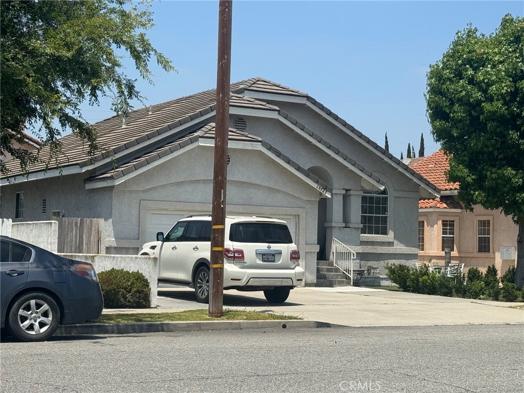 a front view of a house with garage