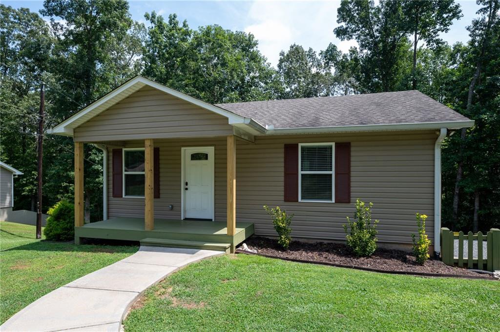 front view of a house with a yard