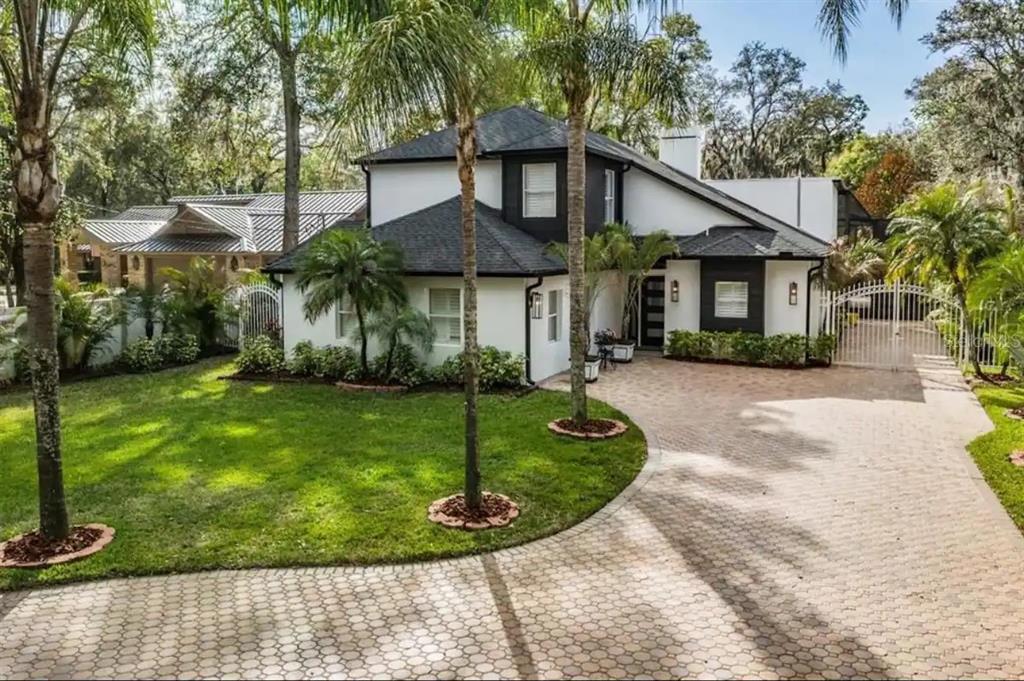 front view of a house with a yard