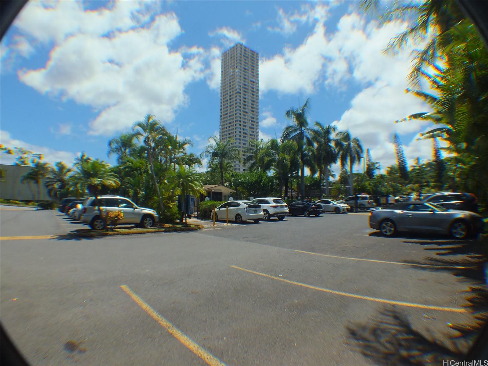 a view of street with parked cars