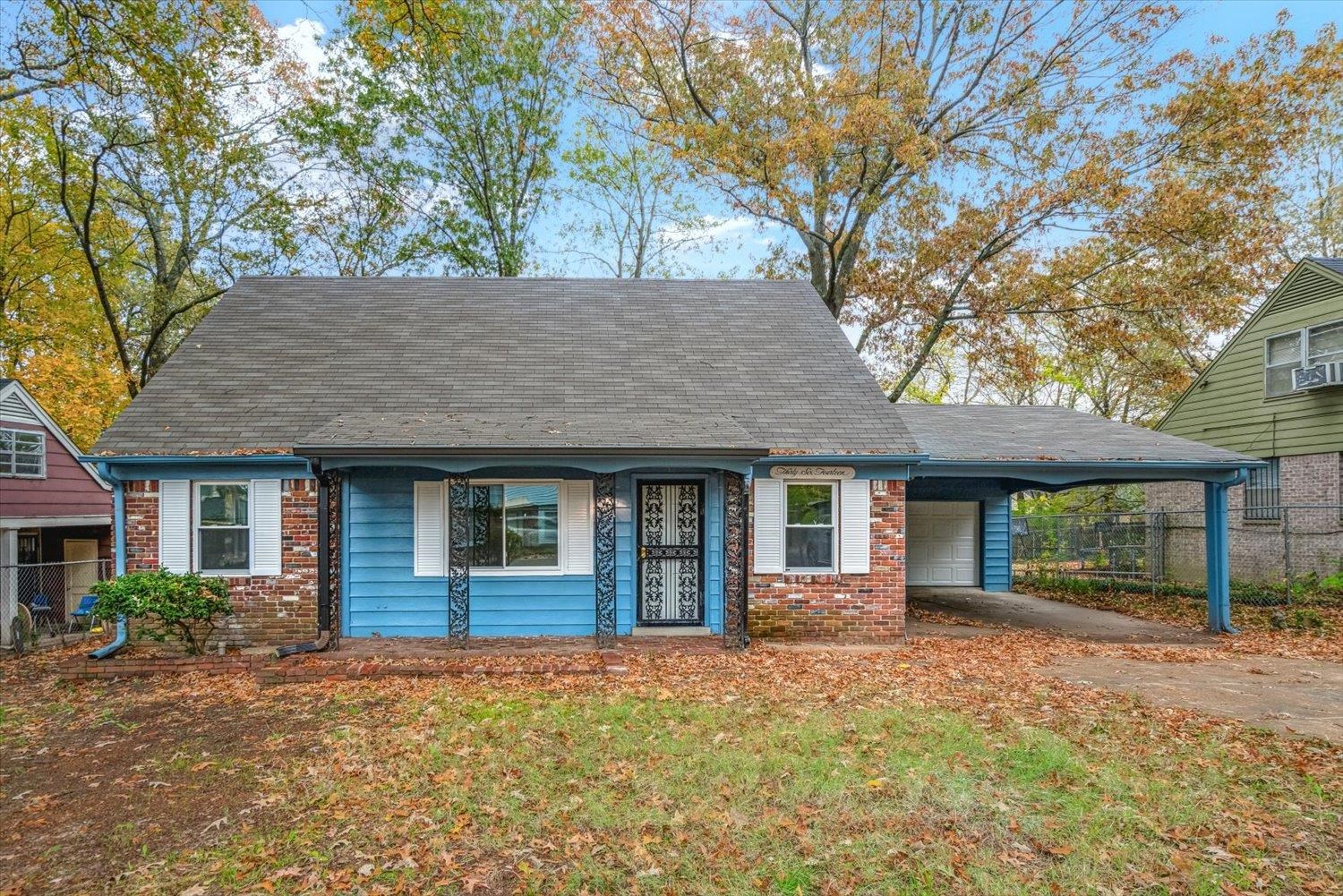 a house with trees in front of it