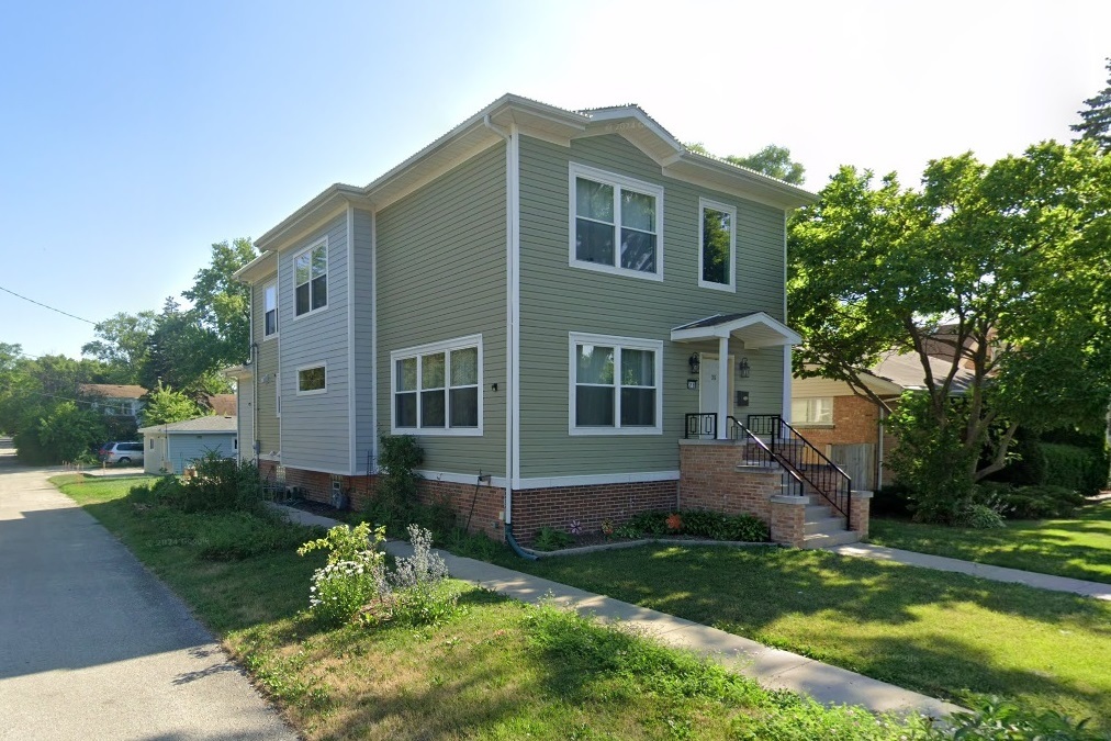 front view of house with a yard