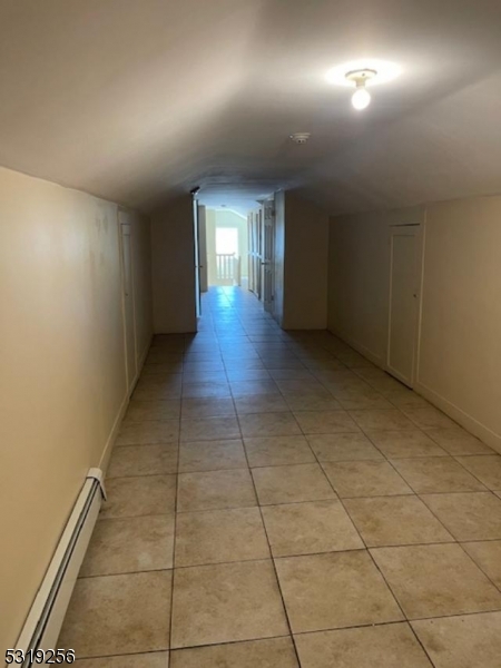 a view of hallway with a window