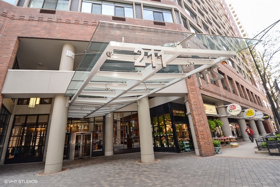 a view of a building with retail shops