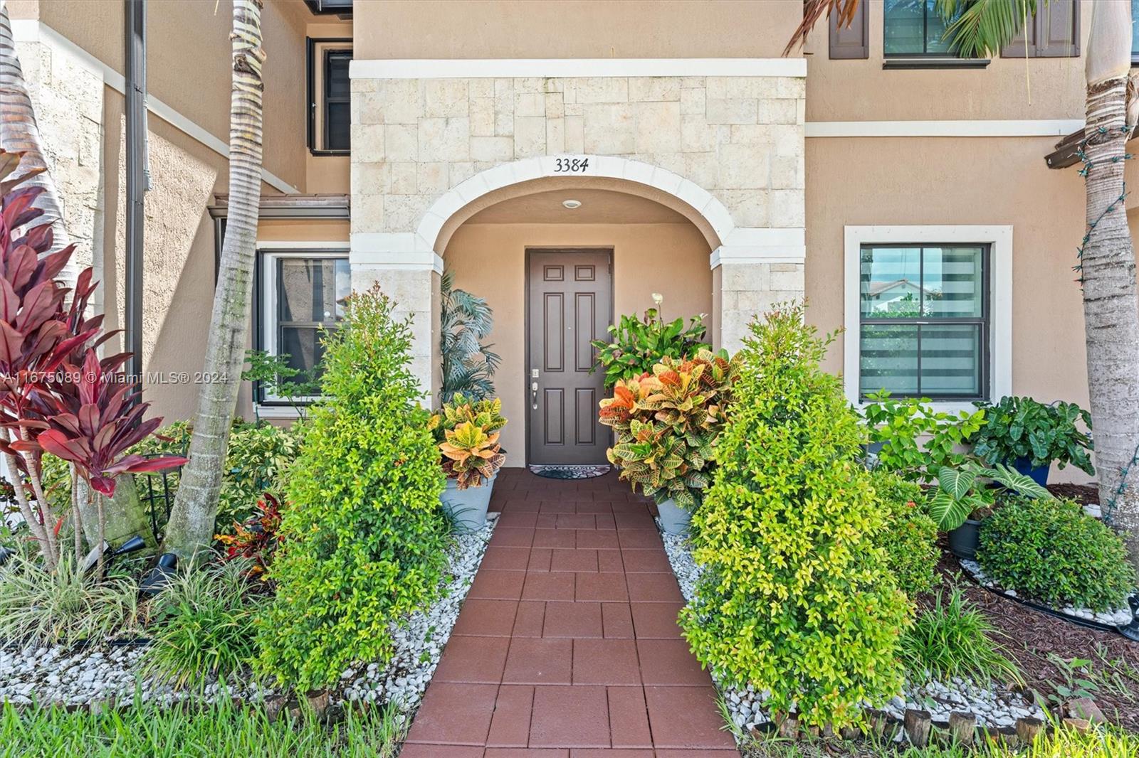 front view of a house with garden