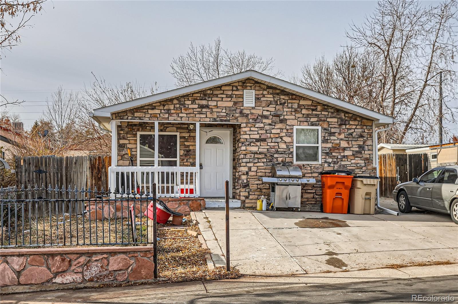 a front view of a house with garage