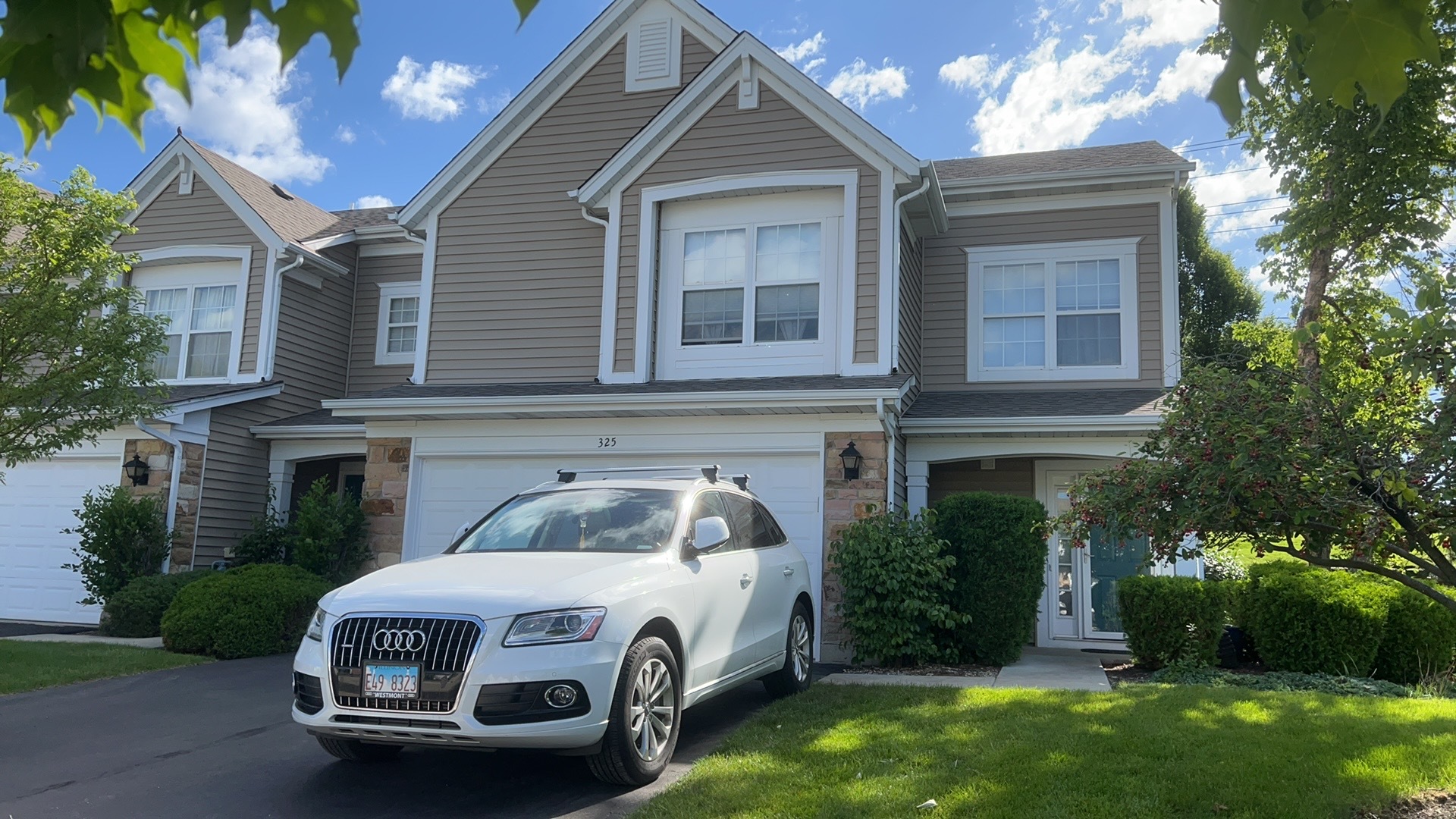 a car parked in front of a house