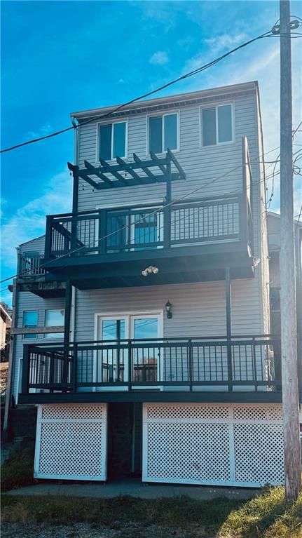 a view of a house with a balcony