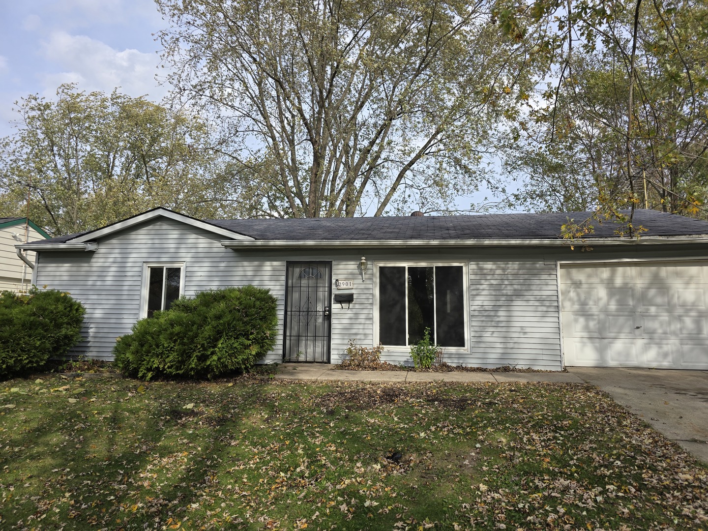 a house with trees in the background