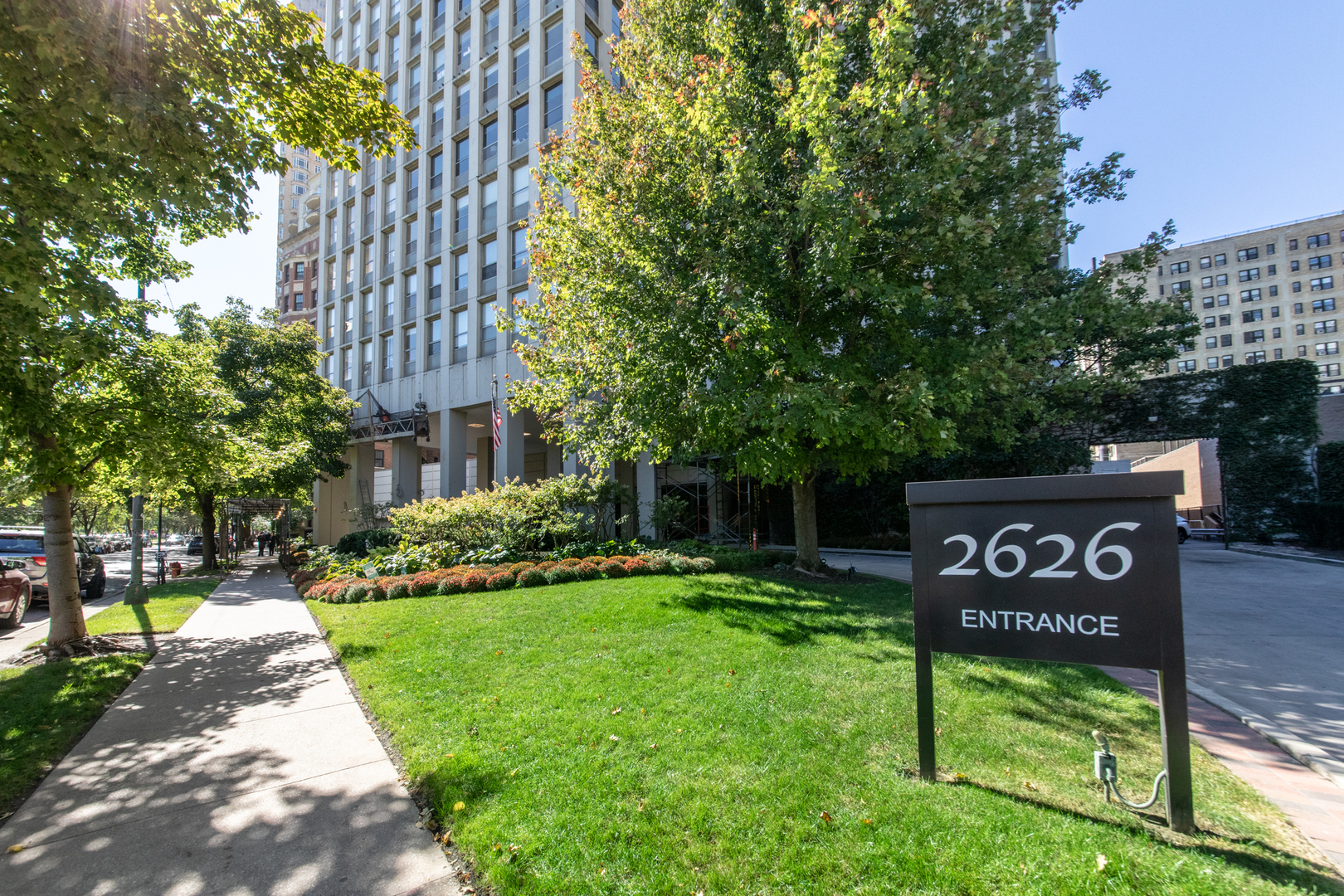 a view of a sign board with a park