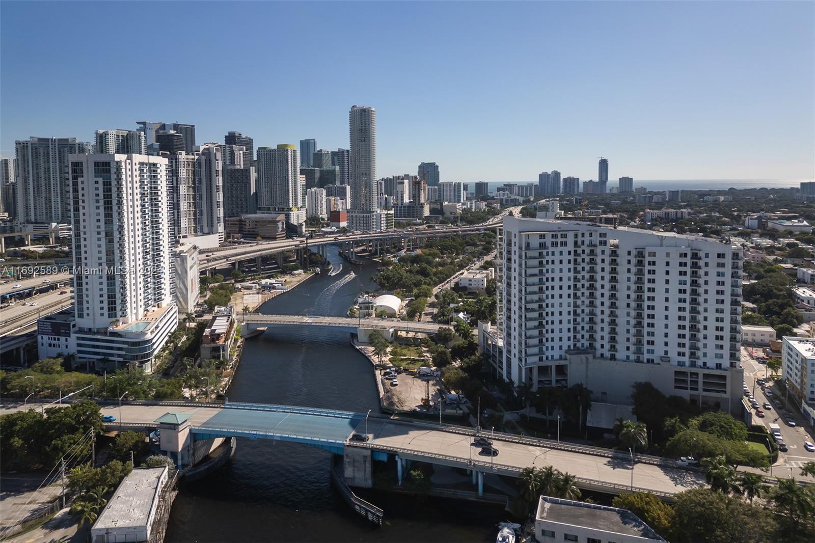 a view of a city with tall buildings