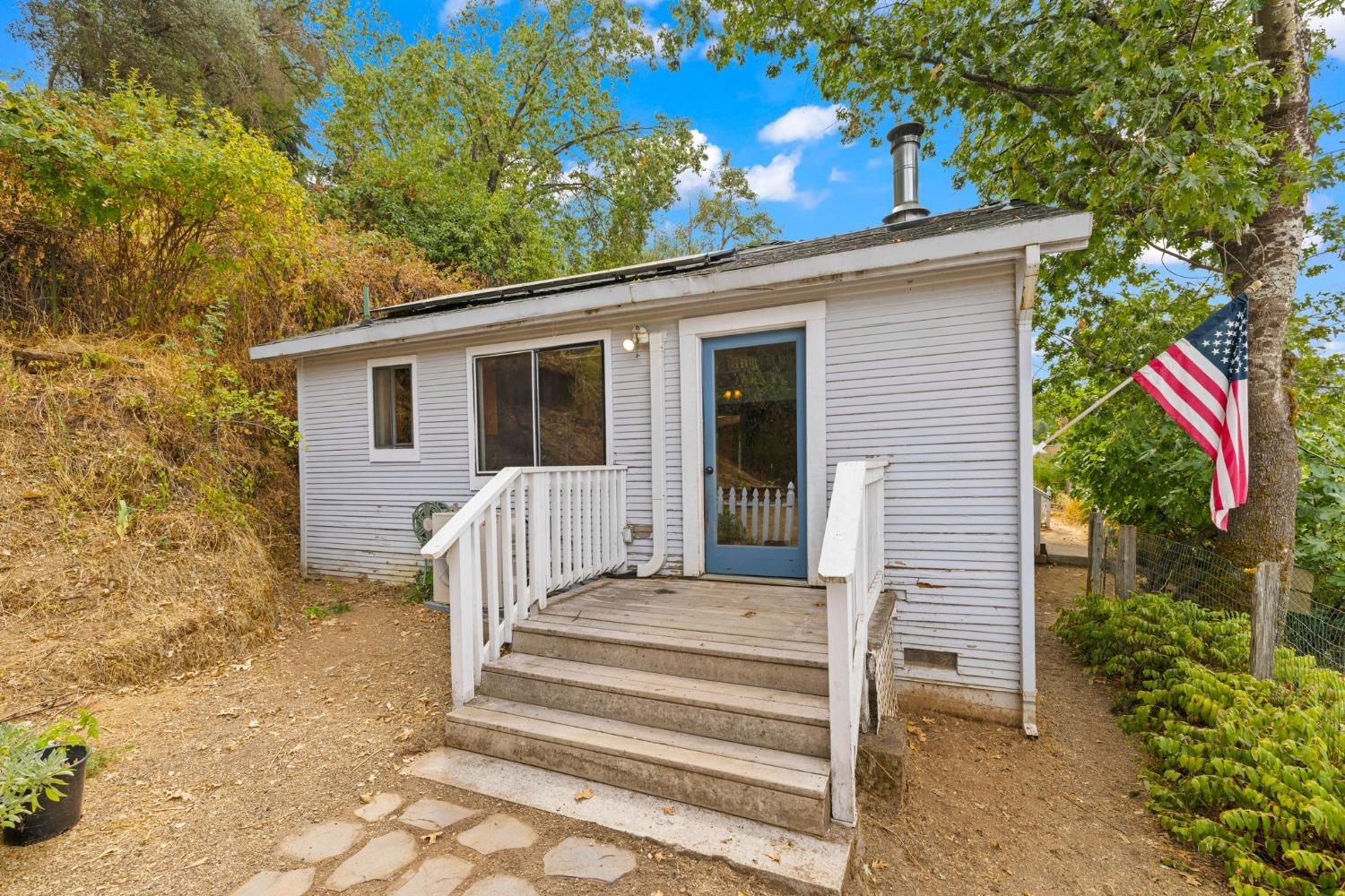 a front view of a house with a porch