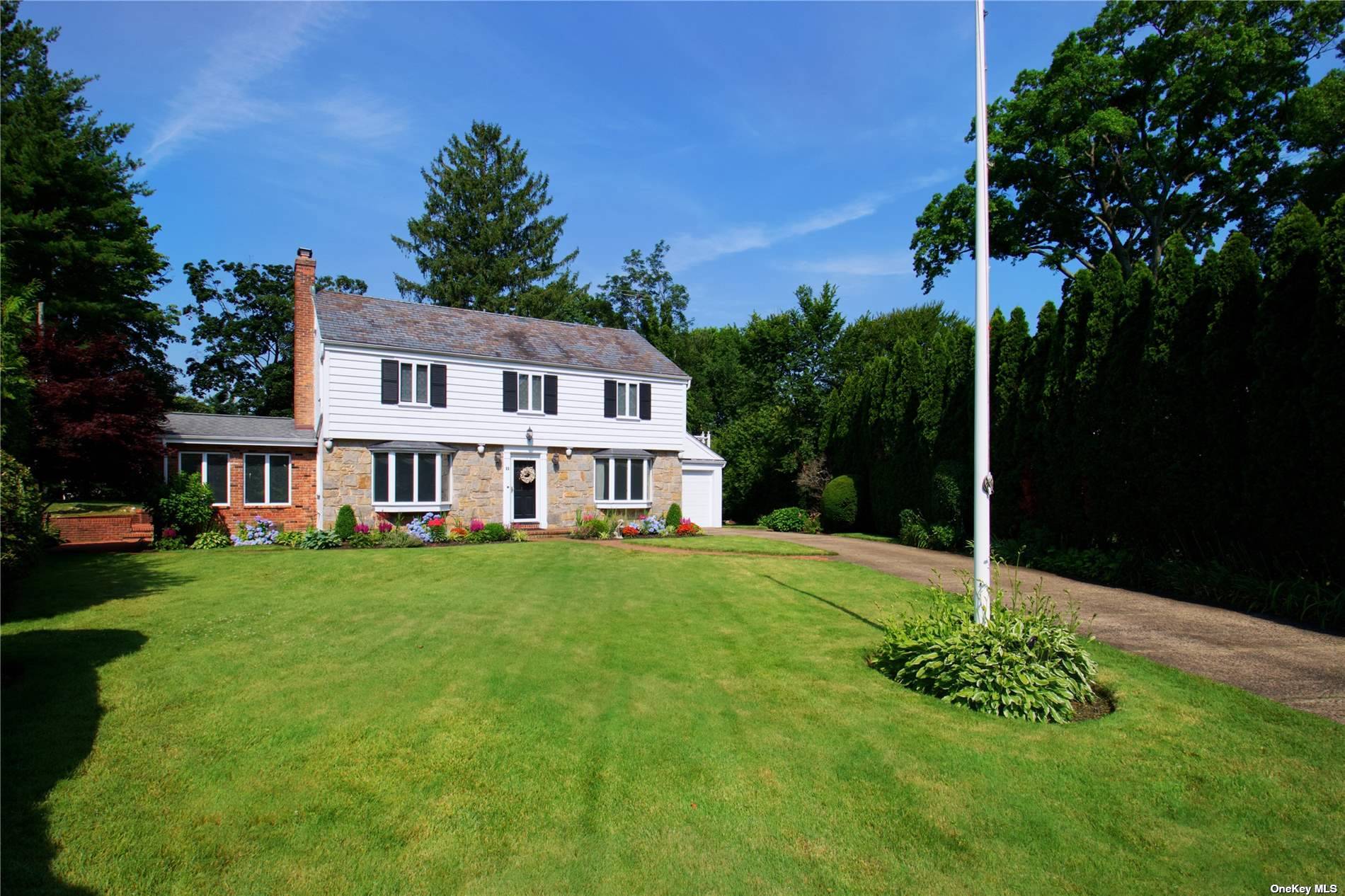 a house view with a garden space