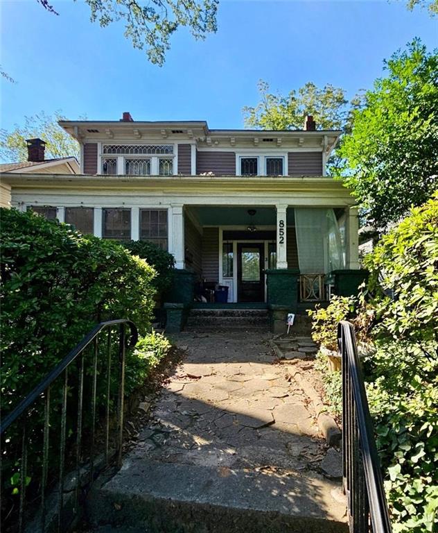 a view of house with outdoor space