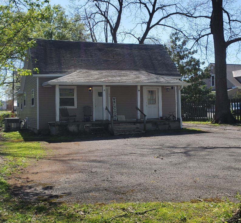 a front view of house with yard