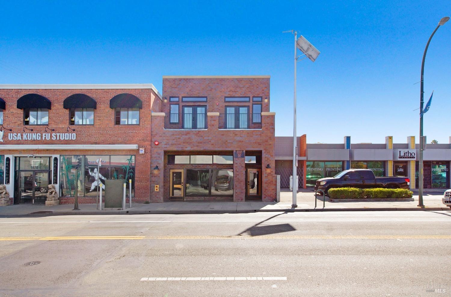 a view of a building with a street