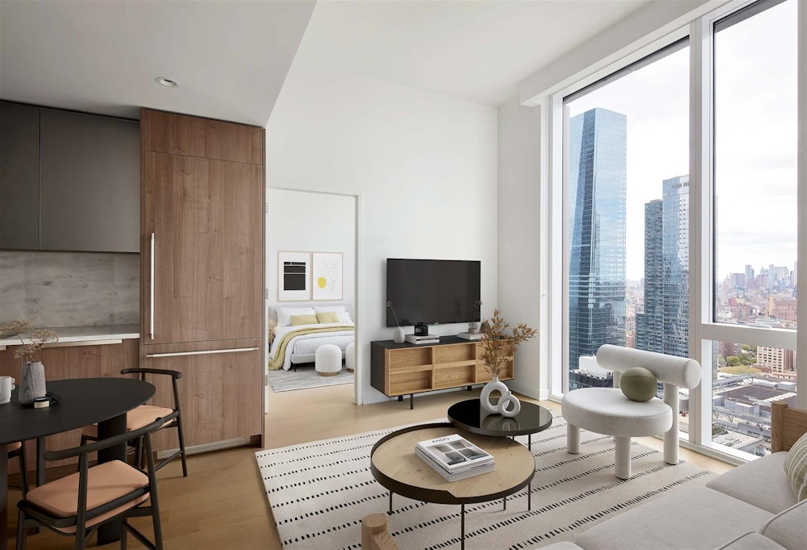 a living room with furniture a flat screen tv and a table