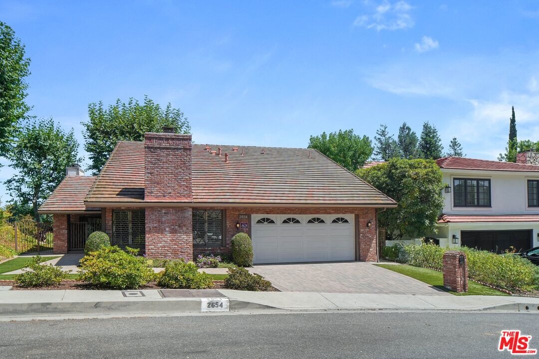 front view of house with a yard