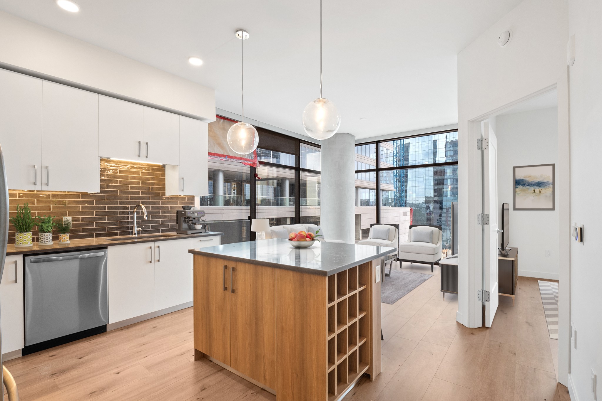 a open kitchen with stainless steel appliances granite countertop a stove and refrigerator