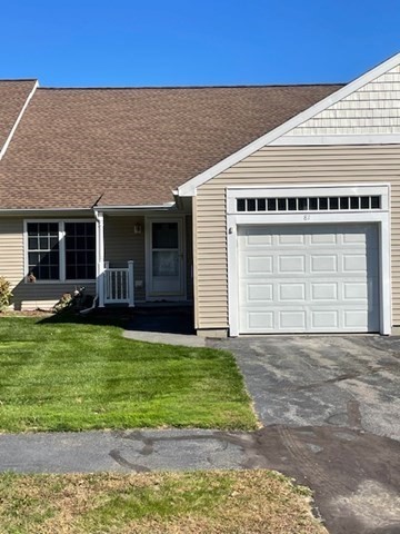 a view of a house with a garden