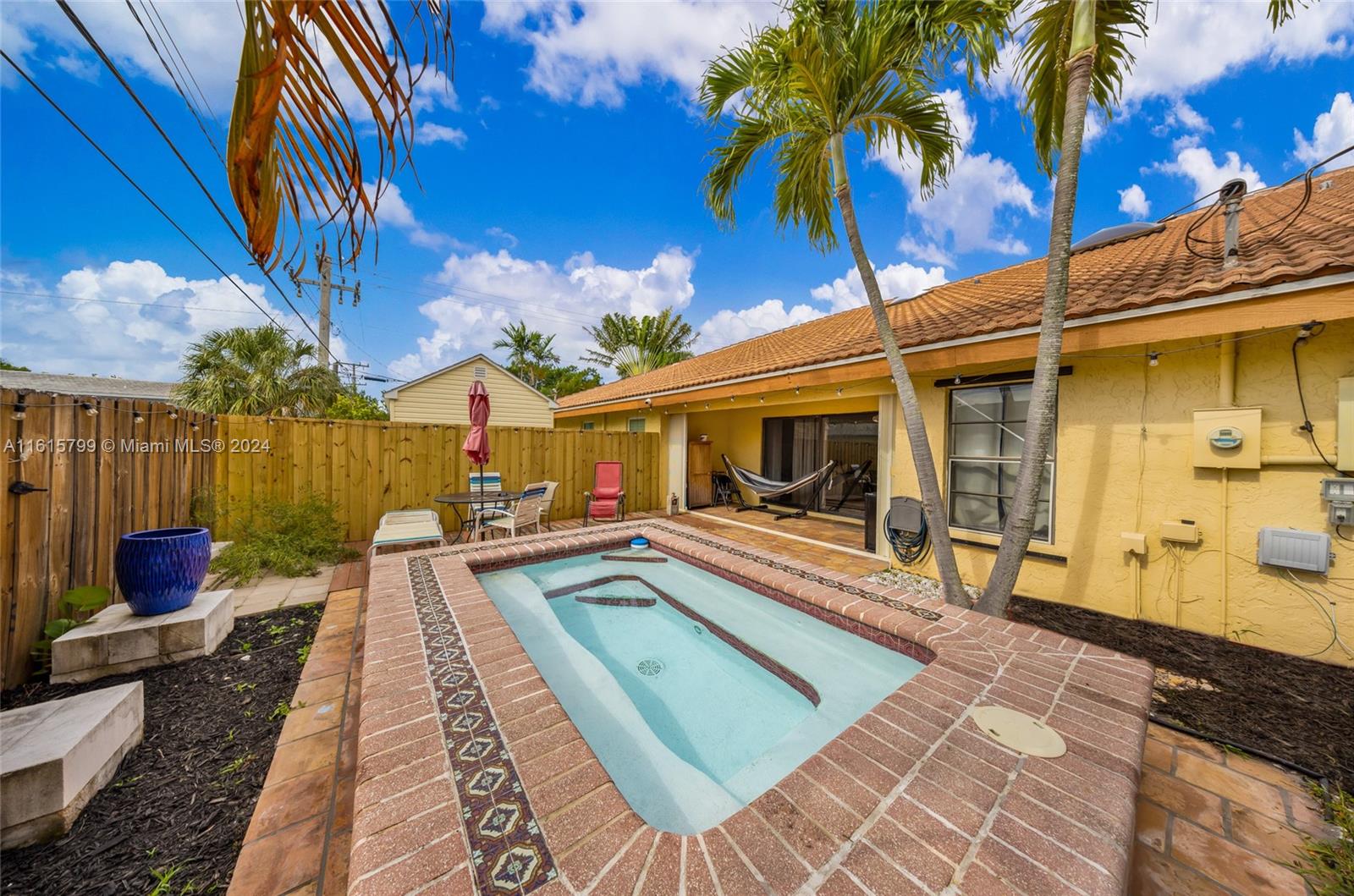 a view of a house with swimming pool