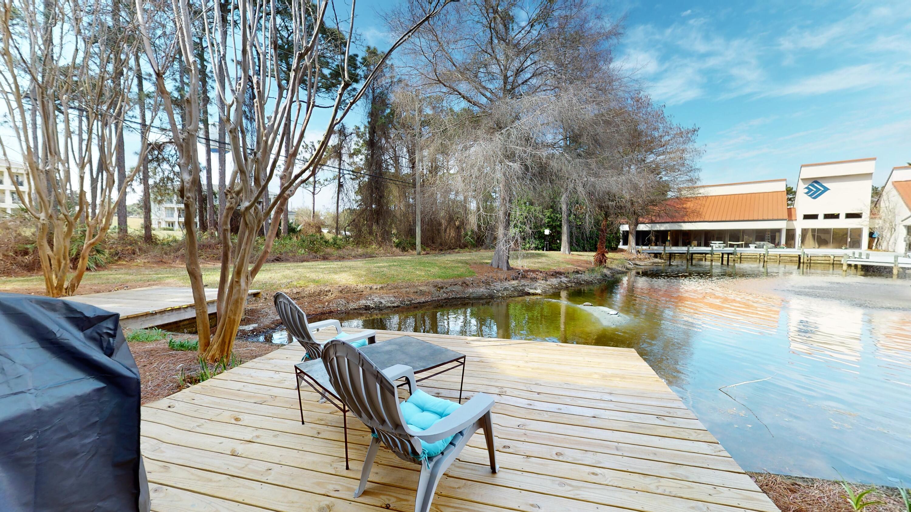 a view of a swimming pool with a lounge chairs