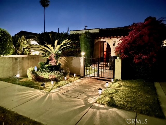 a view of a backyard of the house