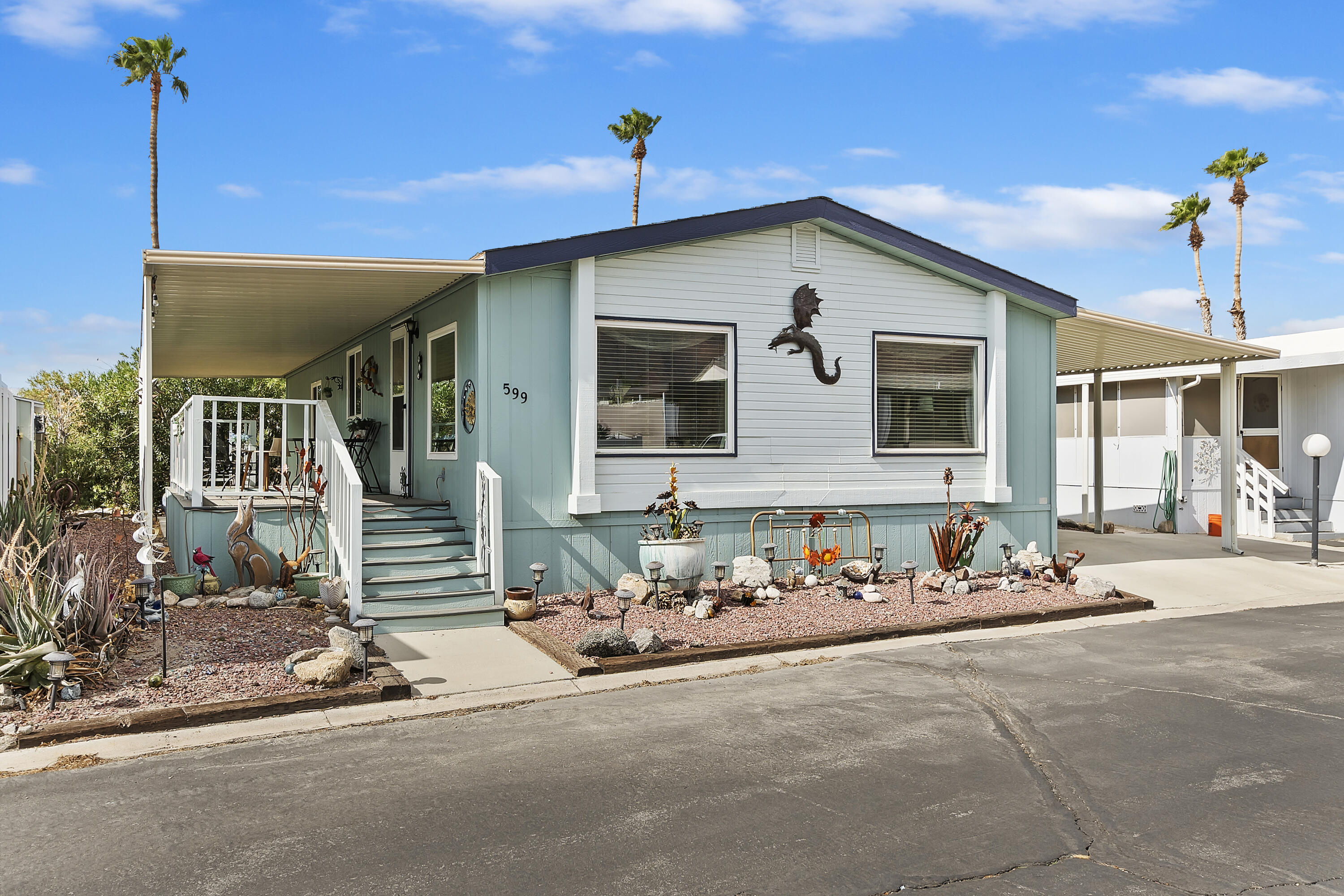 a front view of a house with street