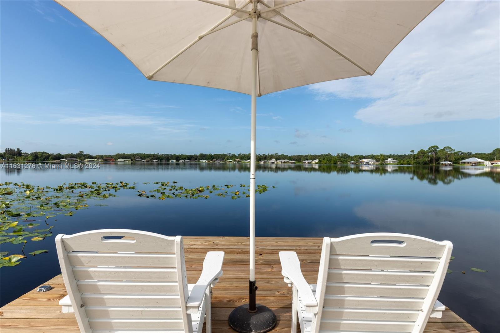 a balcony with a lake view