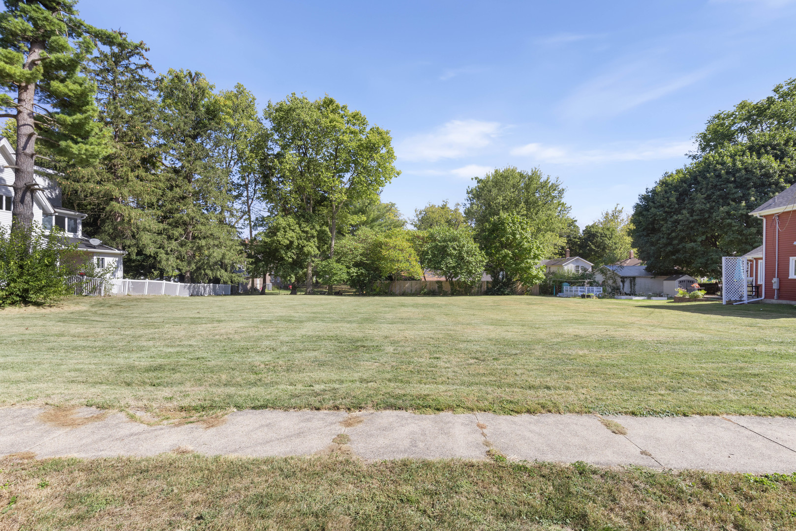 a view of a yard with a trees