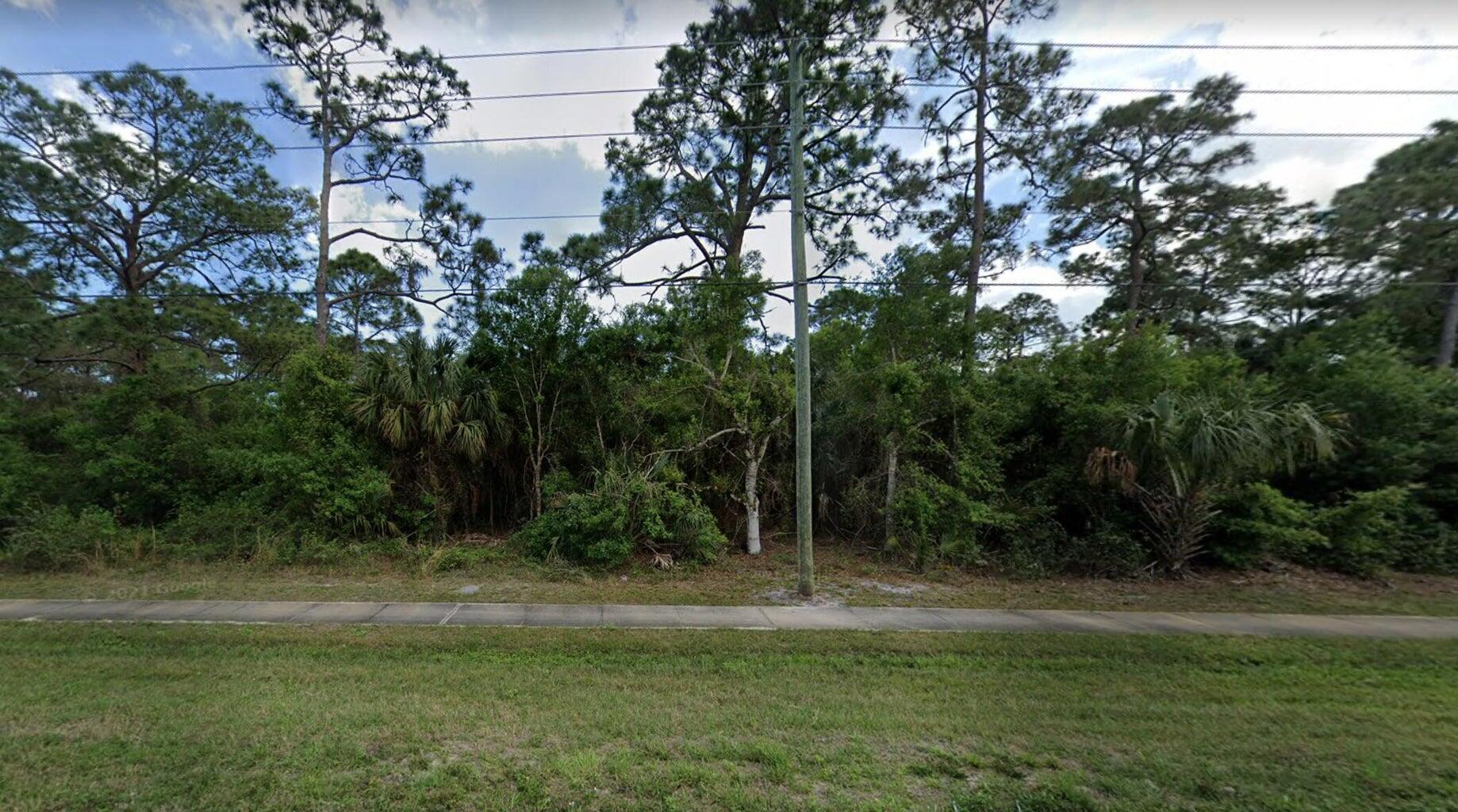 a view of outdoor space and yard