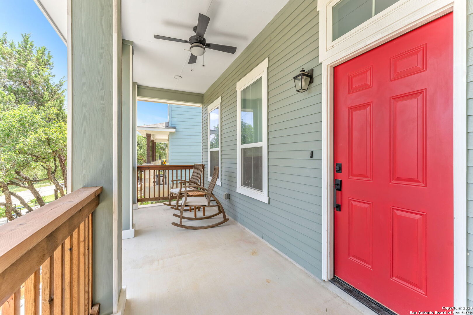 a view of a porch with seating space