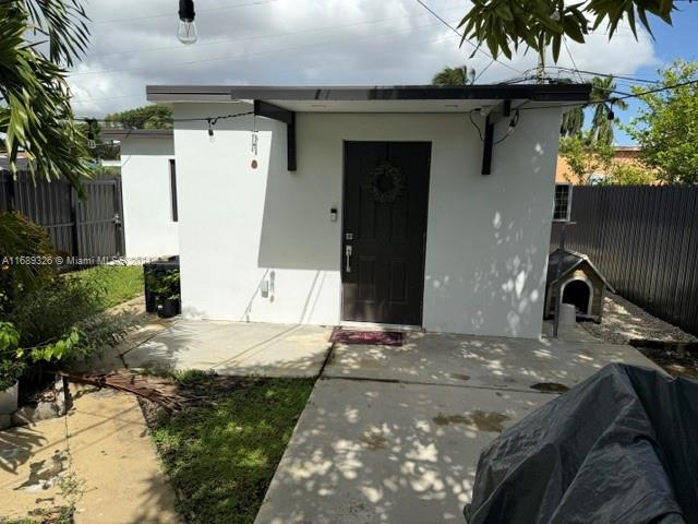 a view of a backyard of the house