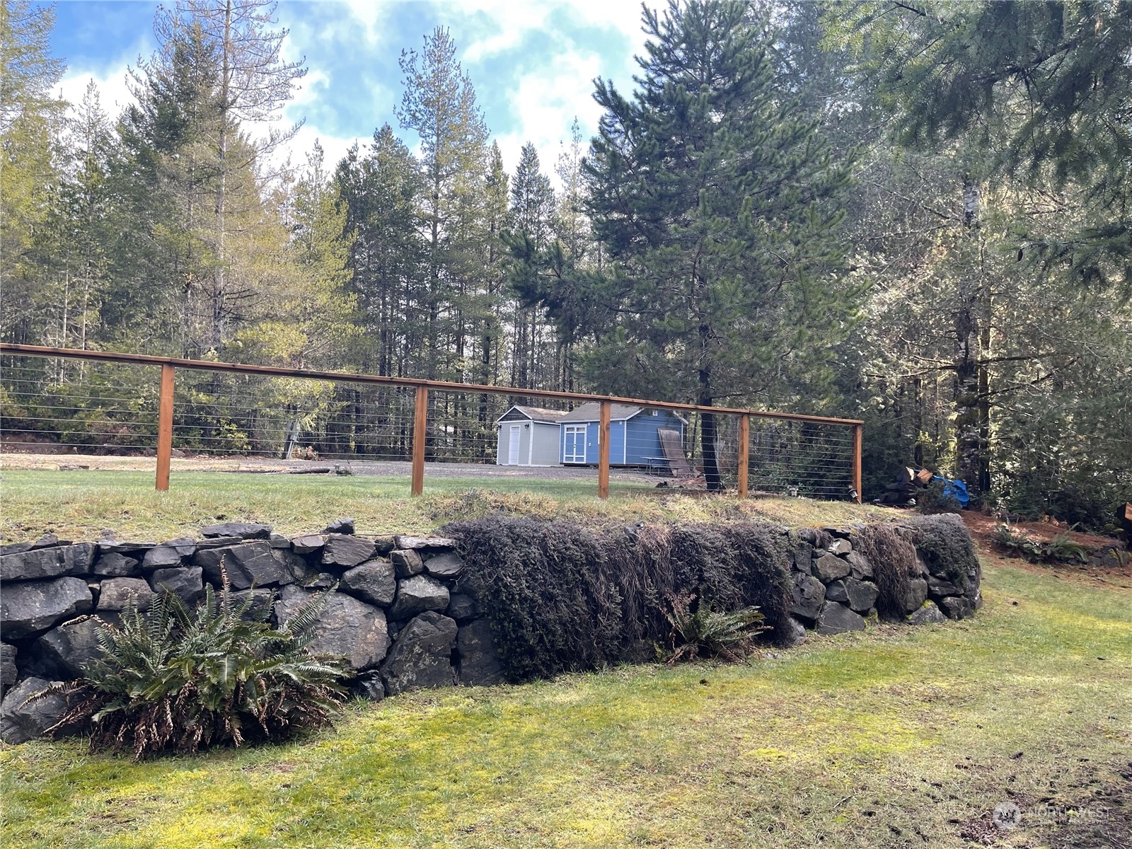 a view of a swimming pool with a yard