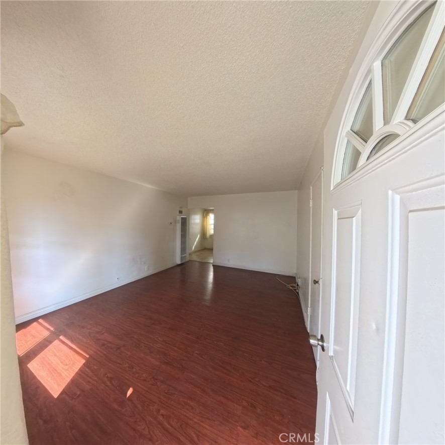 a view of empty room with stairs