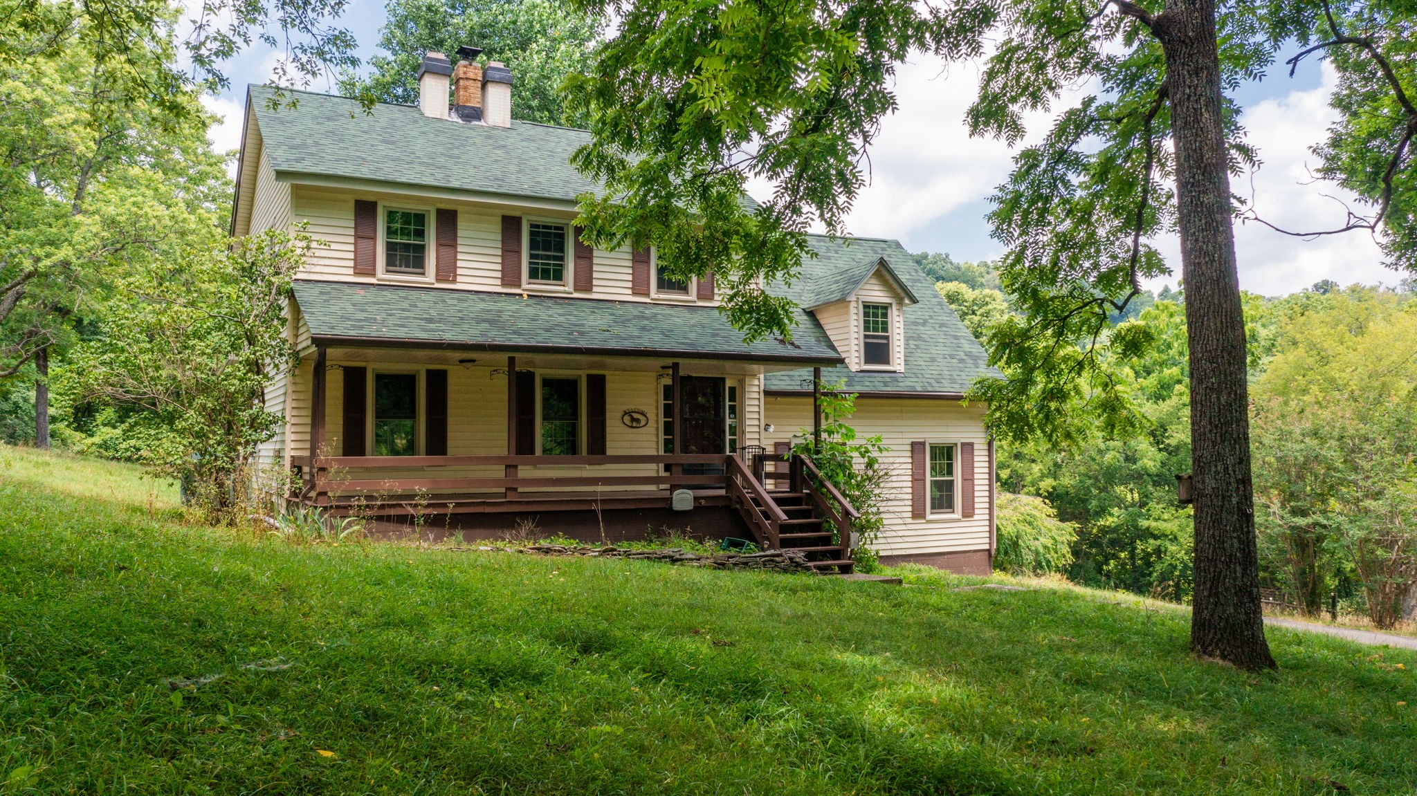 front view of a house with a yard