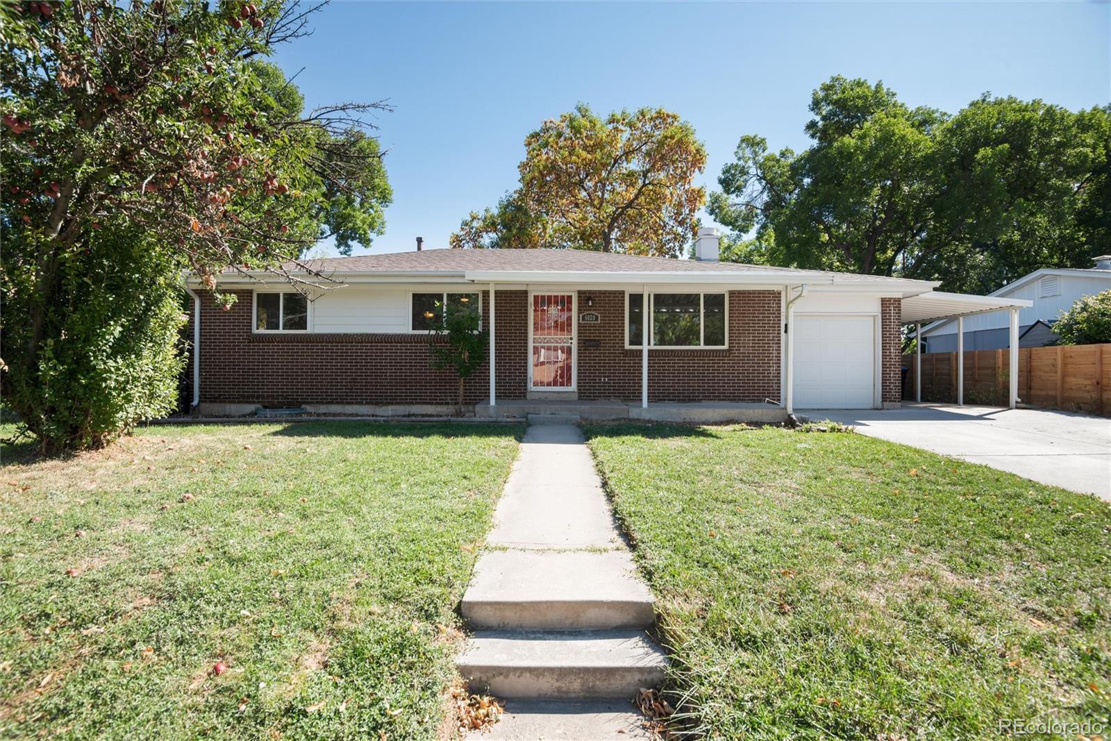 front view of a house and a yard