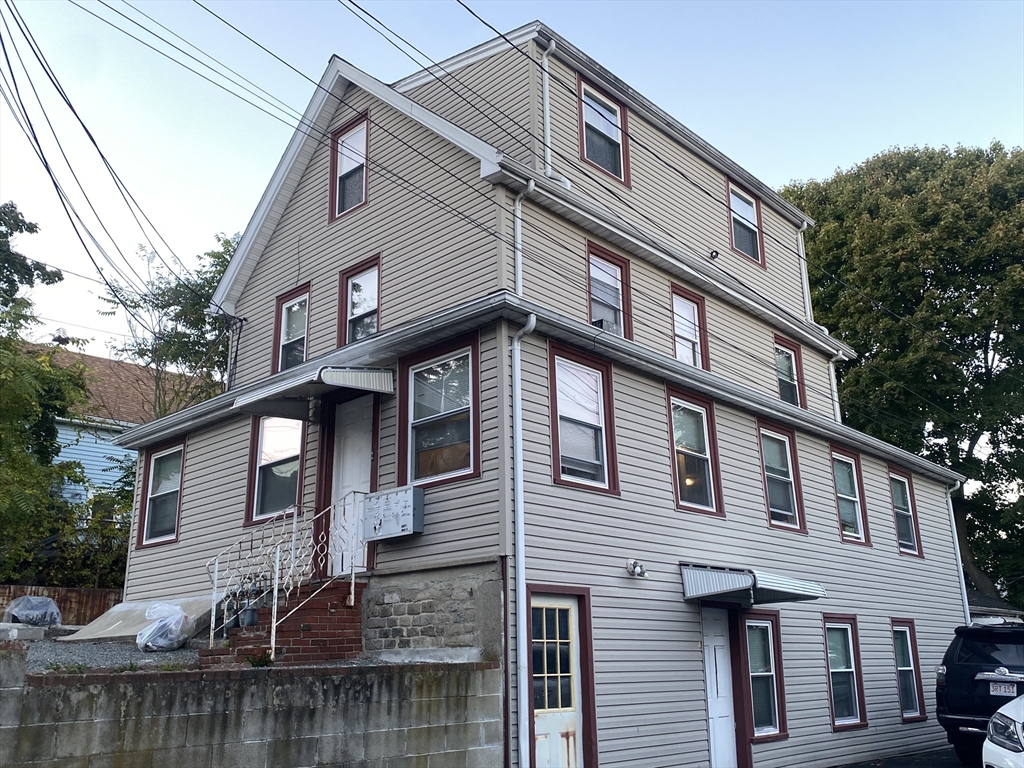 a front view of a house with a balcony