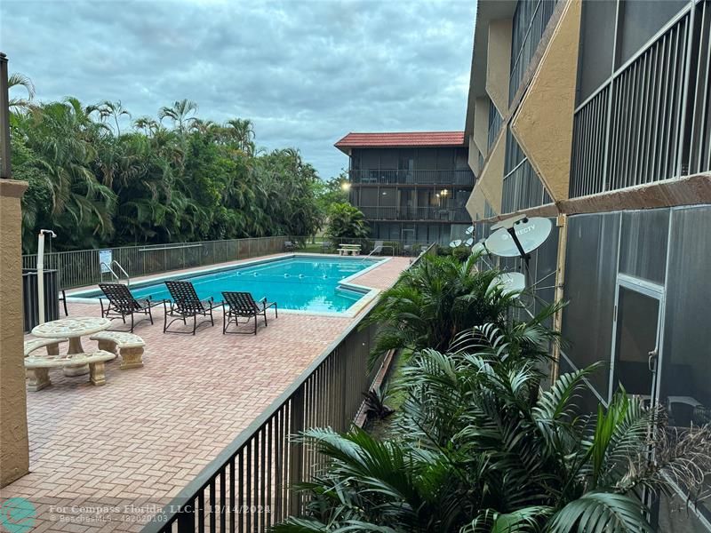 a terrace view with sitting space and garden