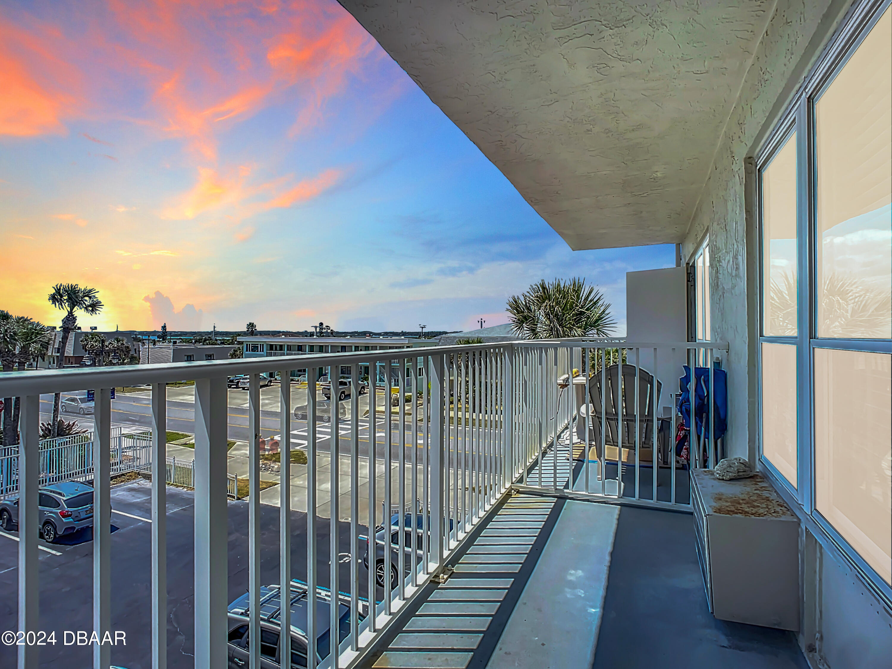 a view of a balcony with an outdoor space