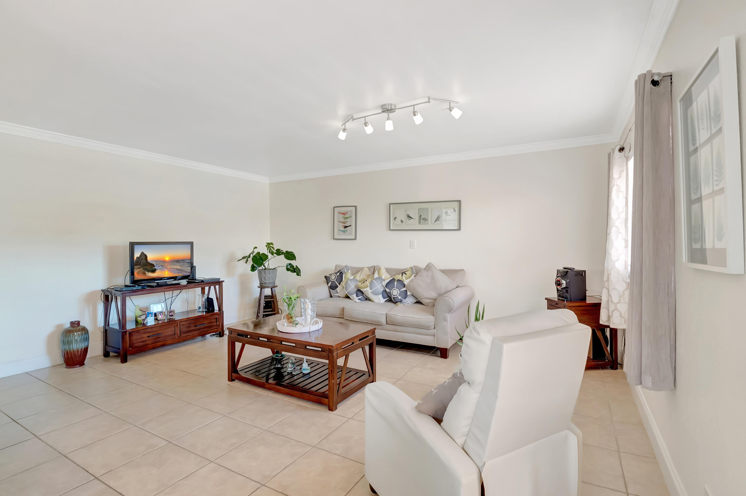 a living room with furniture and a couch